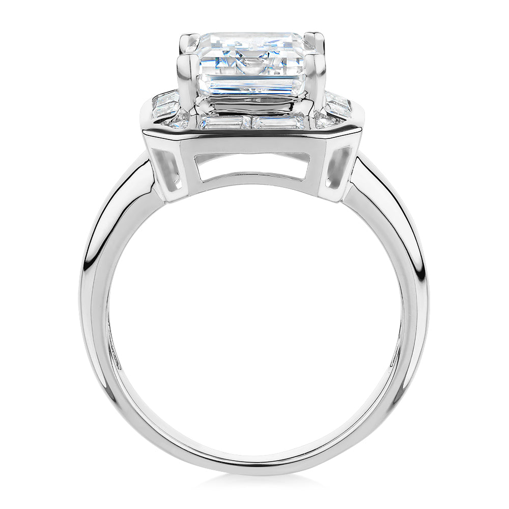 Emerald Cut, Baguette and Round Brilliant halo engagement ring with 4.53 carats* of diamond simulant
