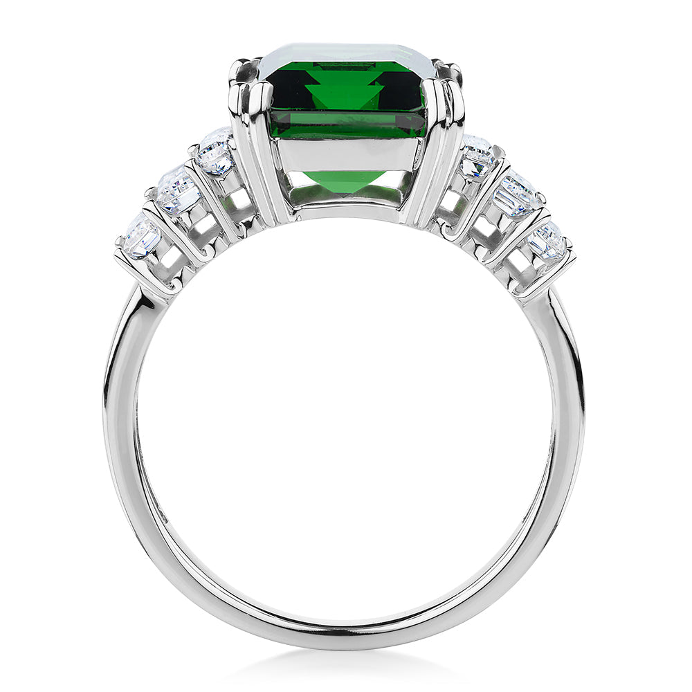 Dress ring with emerald simulant and 1.44 carats* of diamond simulants in 10 carat white gold