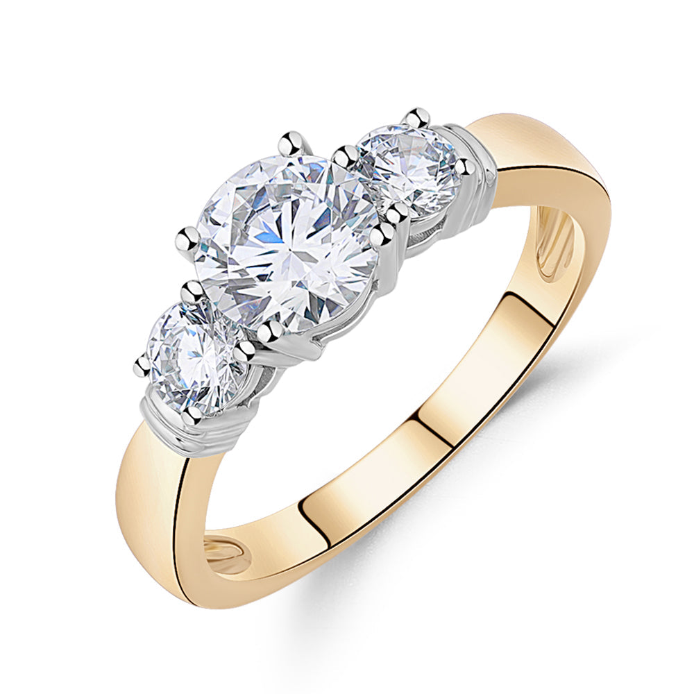 Three stone ring with 1.53 carats* of diamond simulants in 14 carat yellow and white gold