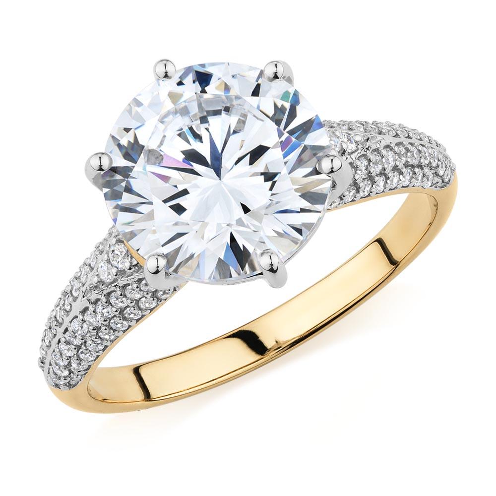 Round Brilliant shouldered engagement ring with 4.08 carats* of diamond simulants in 10 carat yellow and white gold