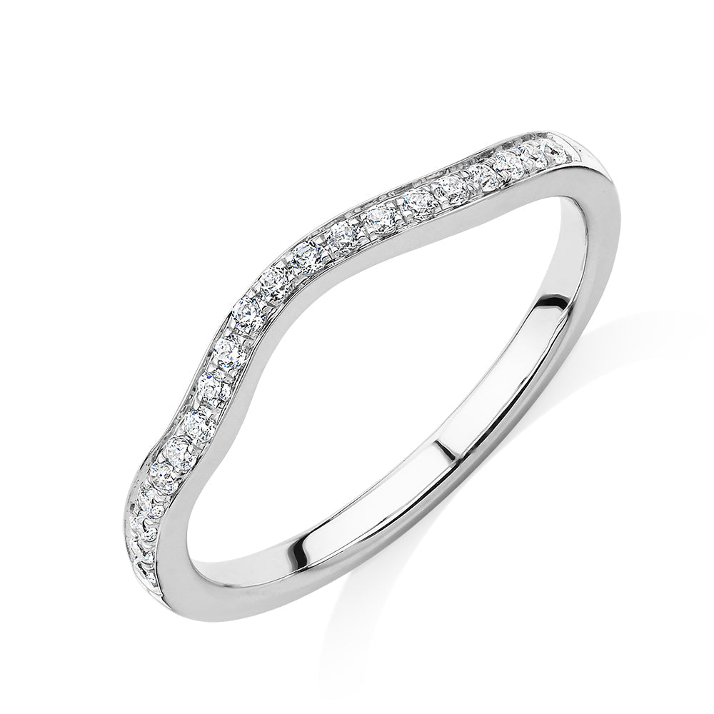 Round Brilliant curved wedding or eternity band in 14 carat white gold