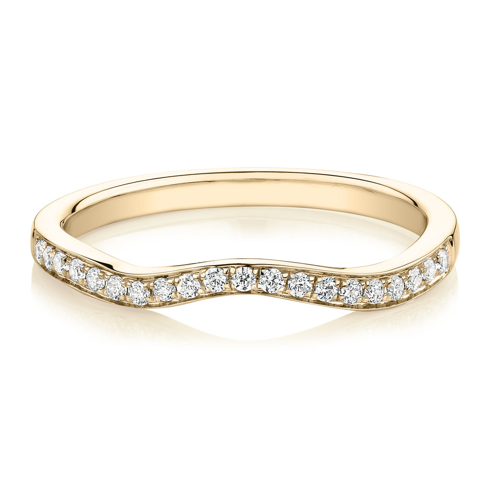 Round Brilliant curved wedding or eternity band in 14 carat yellow gold