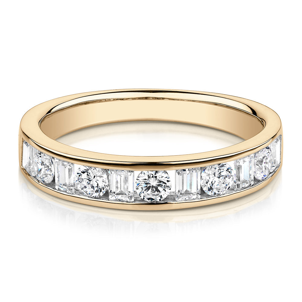 Round Brilliant wedding or eternity band with 0.76 carats* of diamond simulants in 14 carat yellow gold