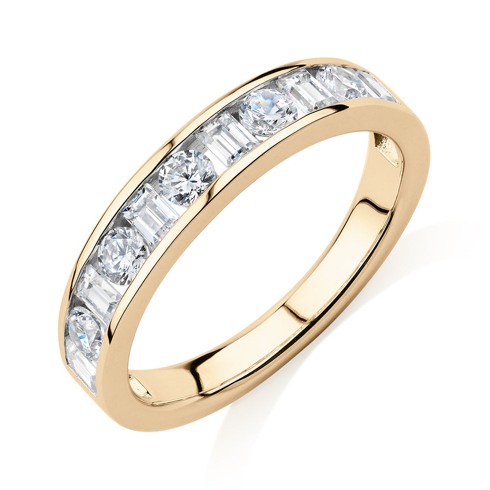 Round Brilliant wedding or eternity band with 0.76 carats* of diamond simulants in 14 carat yellow gold