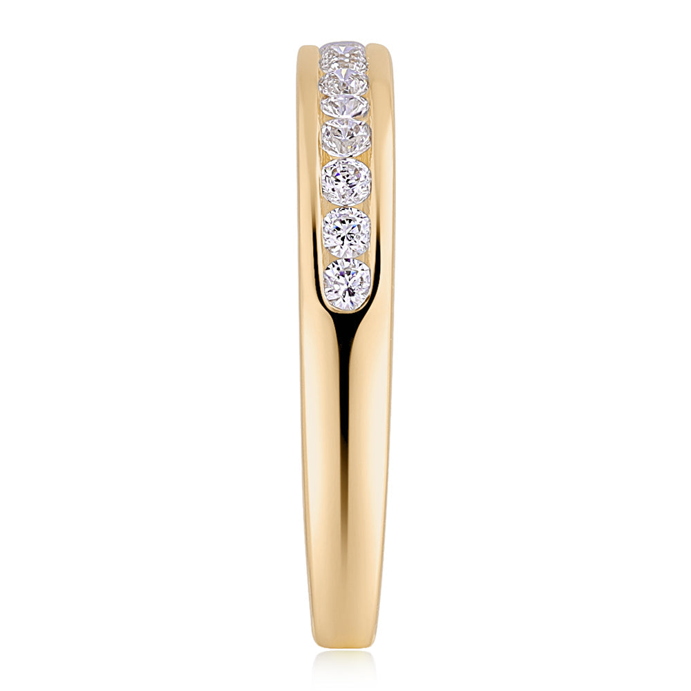 Wedding or eternity band in 14 carat yellow gold