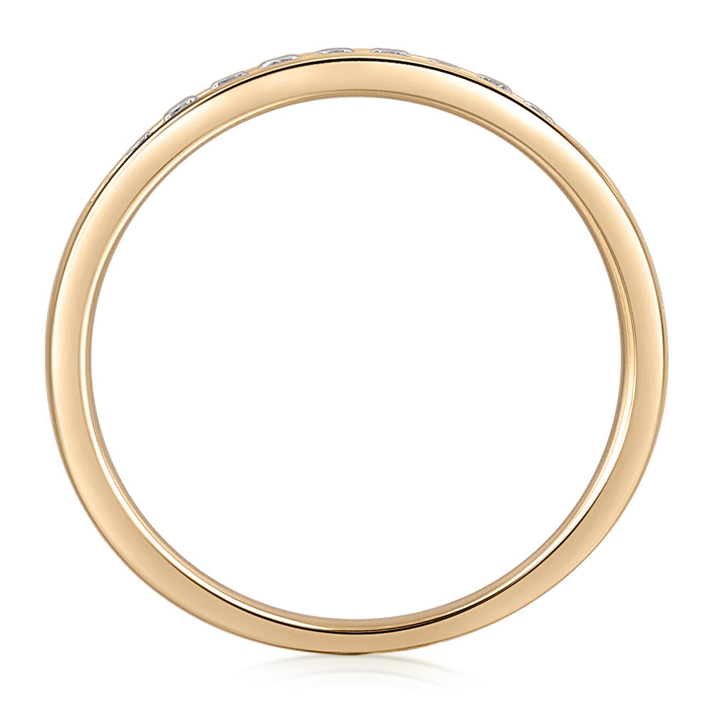 Wedding or eternity band in 14 carat yellow gold