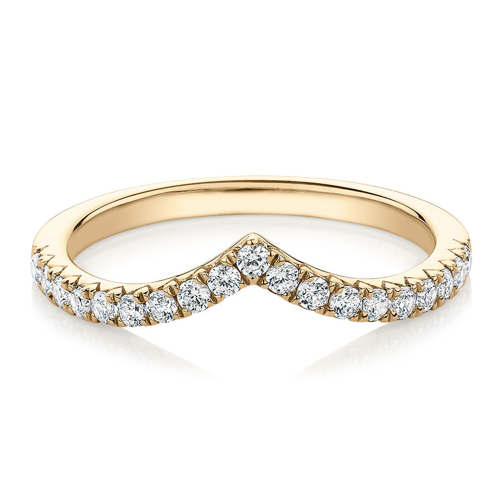 Round Brilliant curved wedding or eternity band with 0.57 carats* of diamond simulants in 10 carat yellow gold