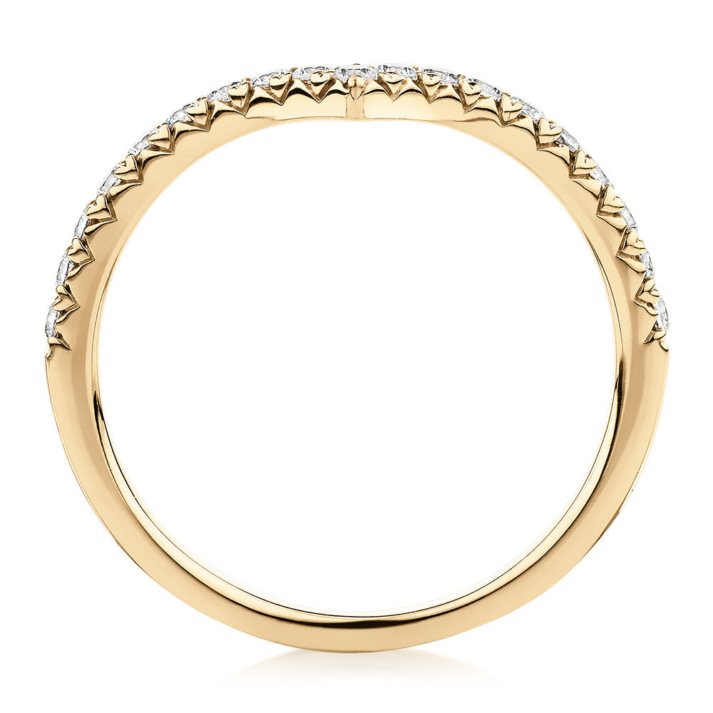 Round Brilliant curved wedding or eternity band with 0.57 carats* of diamond simulants in 10 carat yellow gold