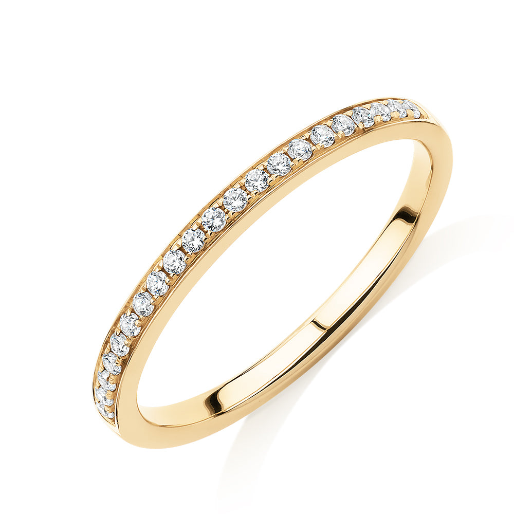 Round Brilliant wedding or eternity band in 14 carat yellow gold
