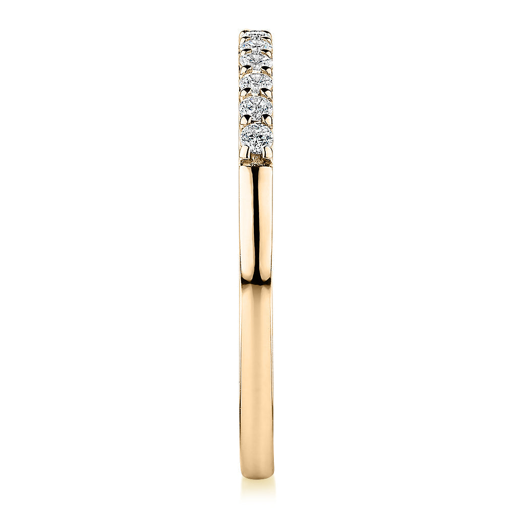 Wedding or eternity band in 14 carat yellow gold