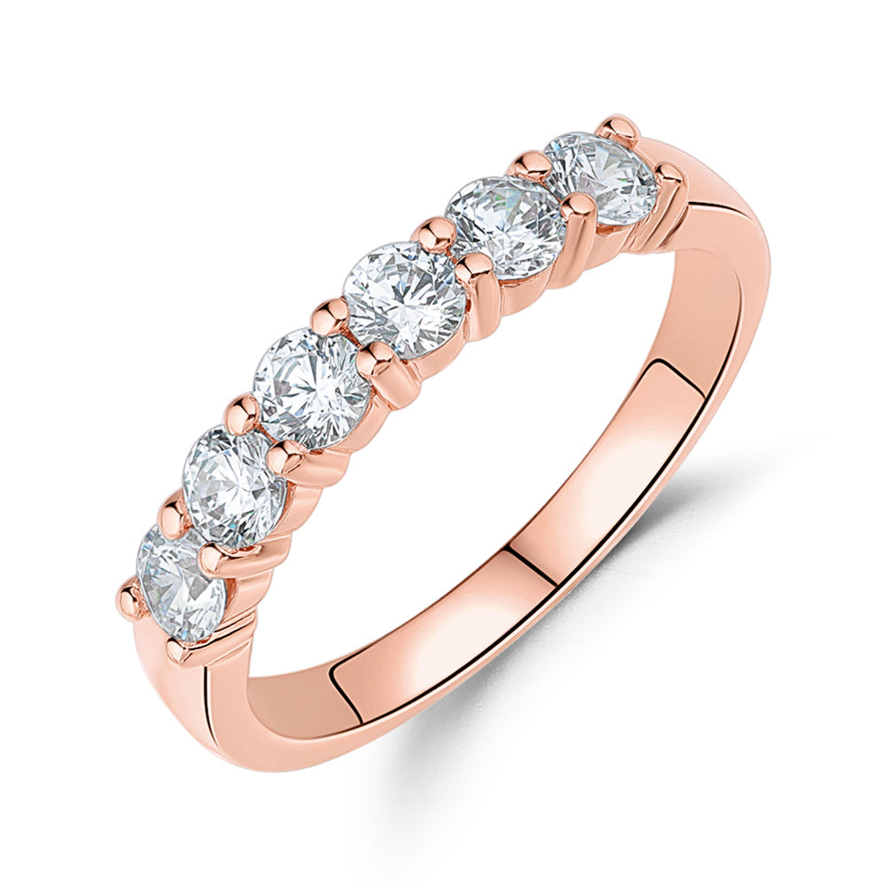 Wedding or eternity band with 0.84 carats* of diamond simulants in 14 carat rose gold