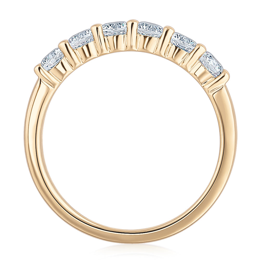 Wedding or eternity band with 0.84 carats* of diamond simulants in 14 carat yellow gold