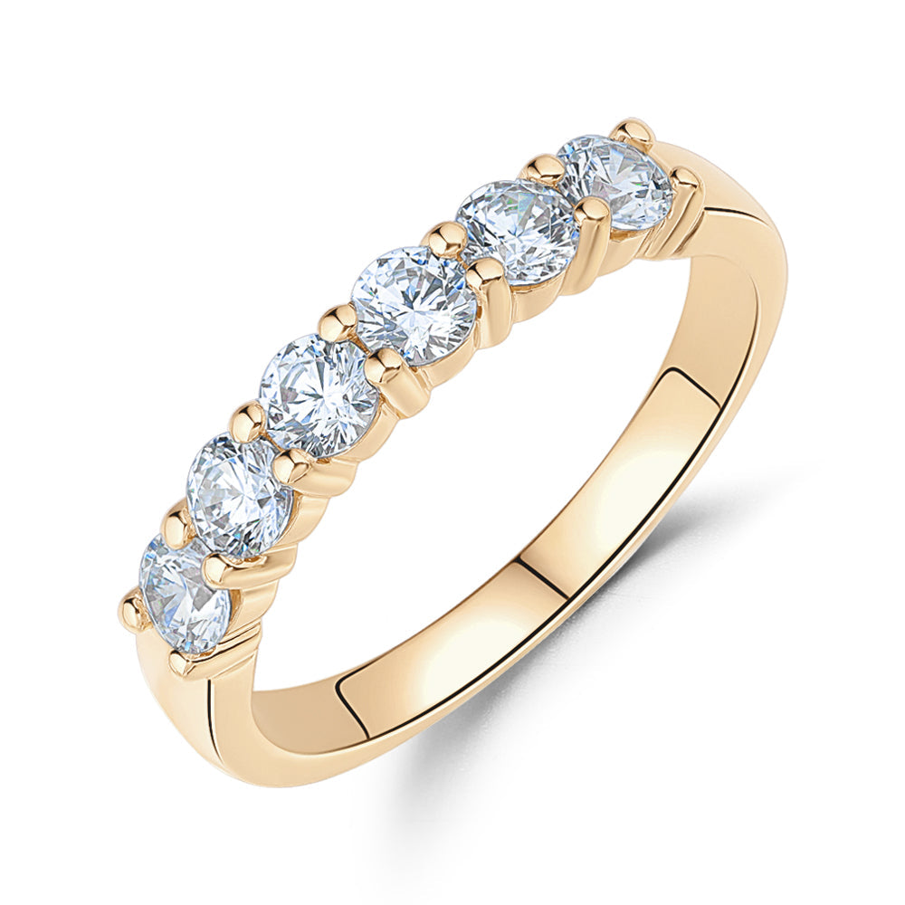 Wedding or eternity band with 0.84 carats* of diamond simulants in 14 carat yellow gold