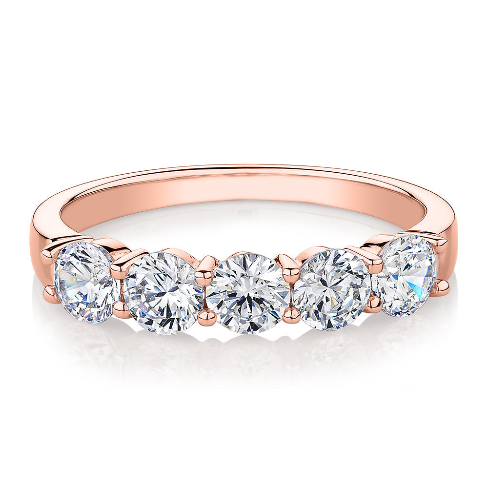Dress ring with 1 carat* of diamond simulants in 14 carat rose gold