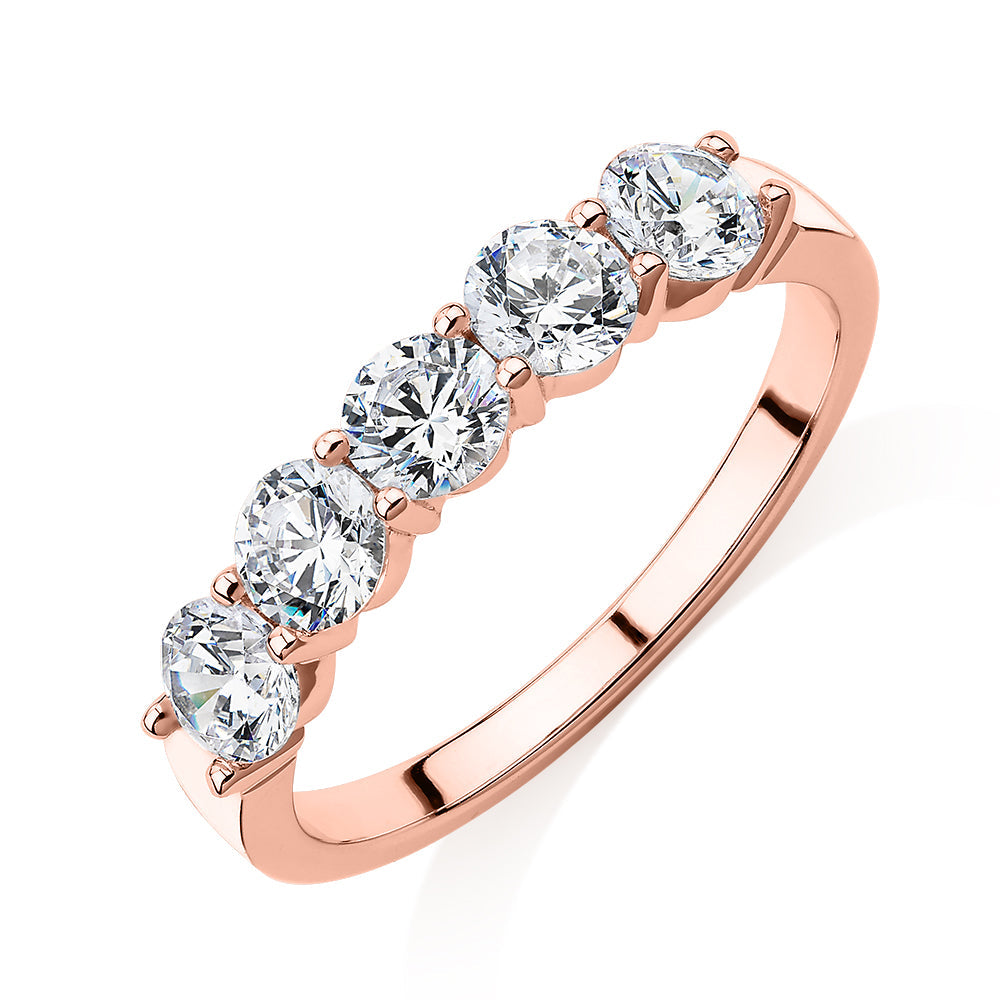 Dress ring with 1 carat* of diamond simulants in 14 carat rose gold