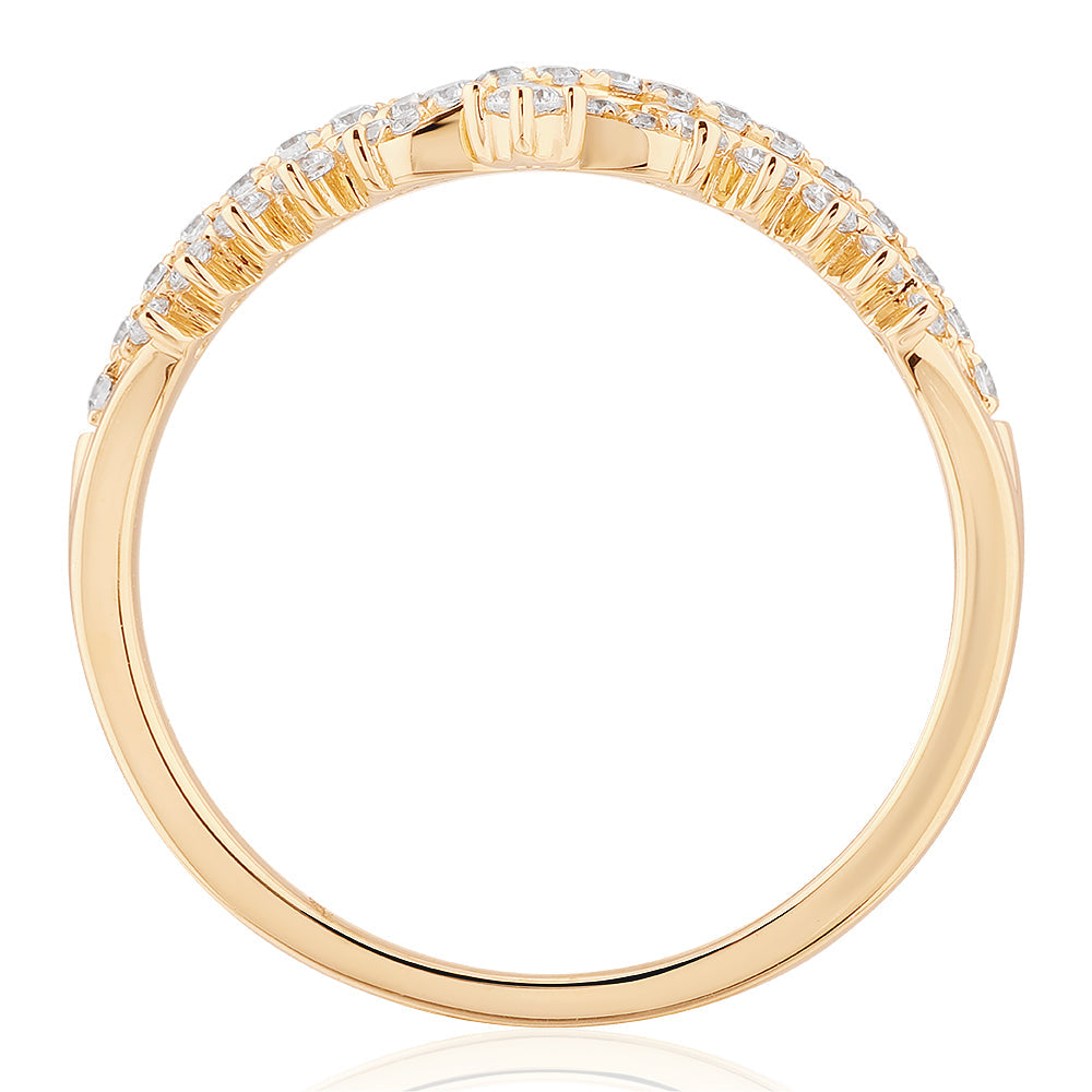 Round Brilliant curved wedding or eternity band with 0.27 carats* of diamond simulants in 10 carat yellow gold