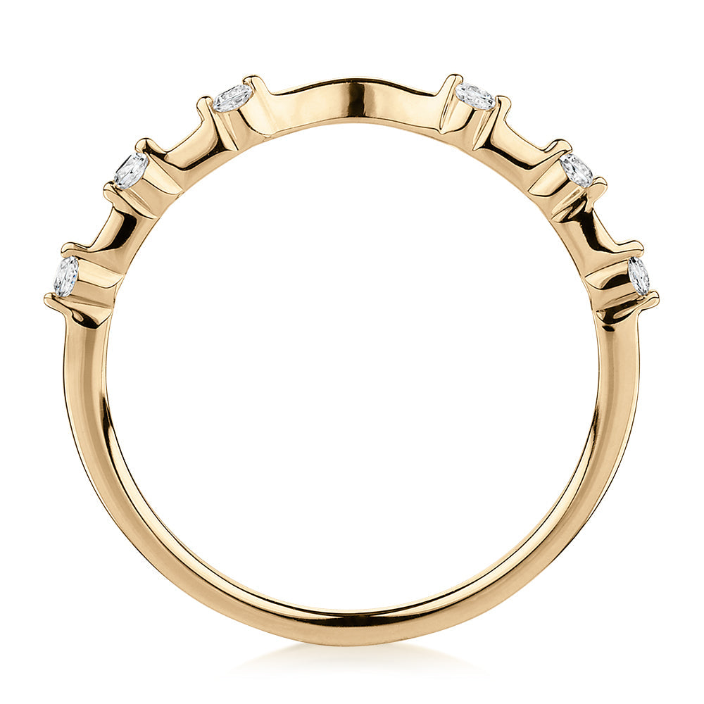 Wedding or eternity band with diamond simulants in 14 carat yellow gold