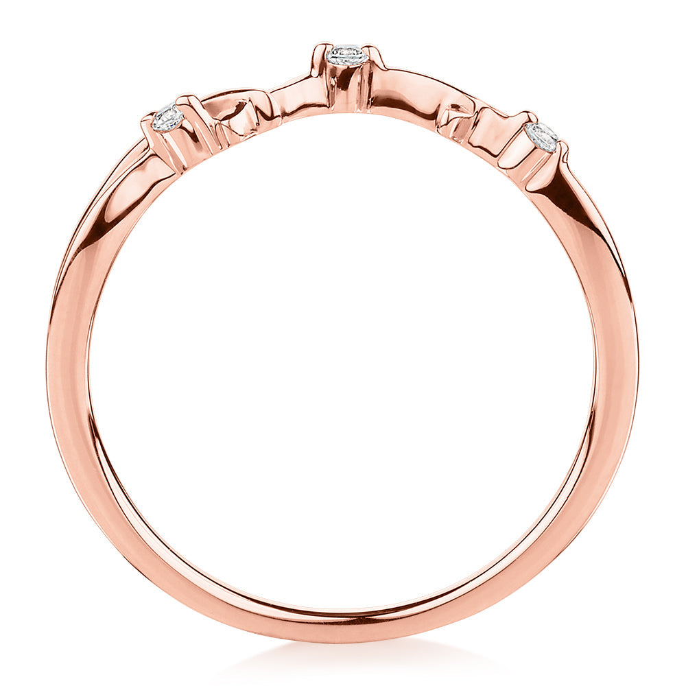 Wedding or eternity band with diamond simulants in 14 carat rose gold