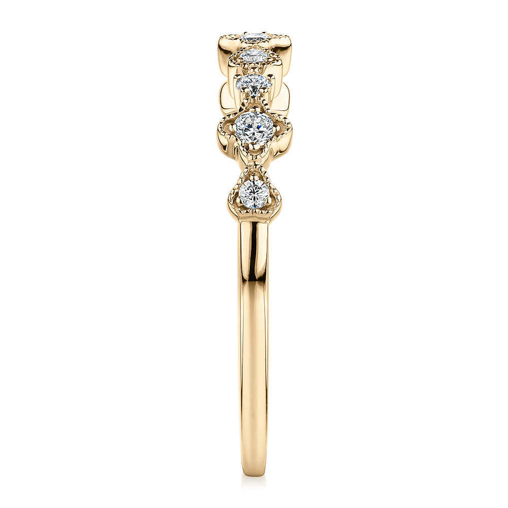Wedding or eternity band with diamond simulants in 10 carat yellow gold