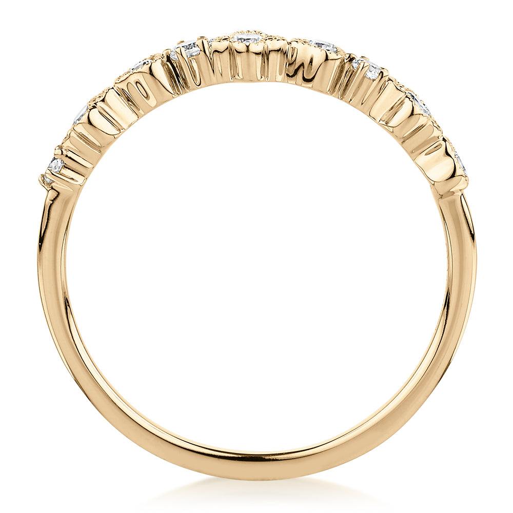 Wedding or eternity band with diamond simulants in 10 carat yellow gold