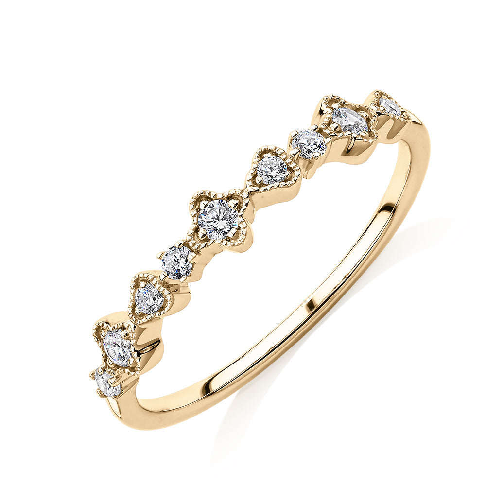 Wedding or eternity band with diamond simulants in 10 carat yellow gold