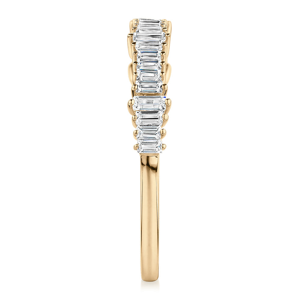 Wedding or eternity band with 0.48 carats* of diamond simulants in 10 carat yellow gold