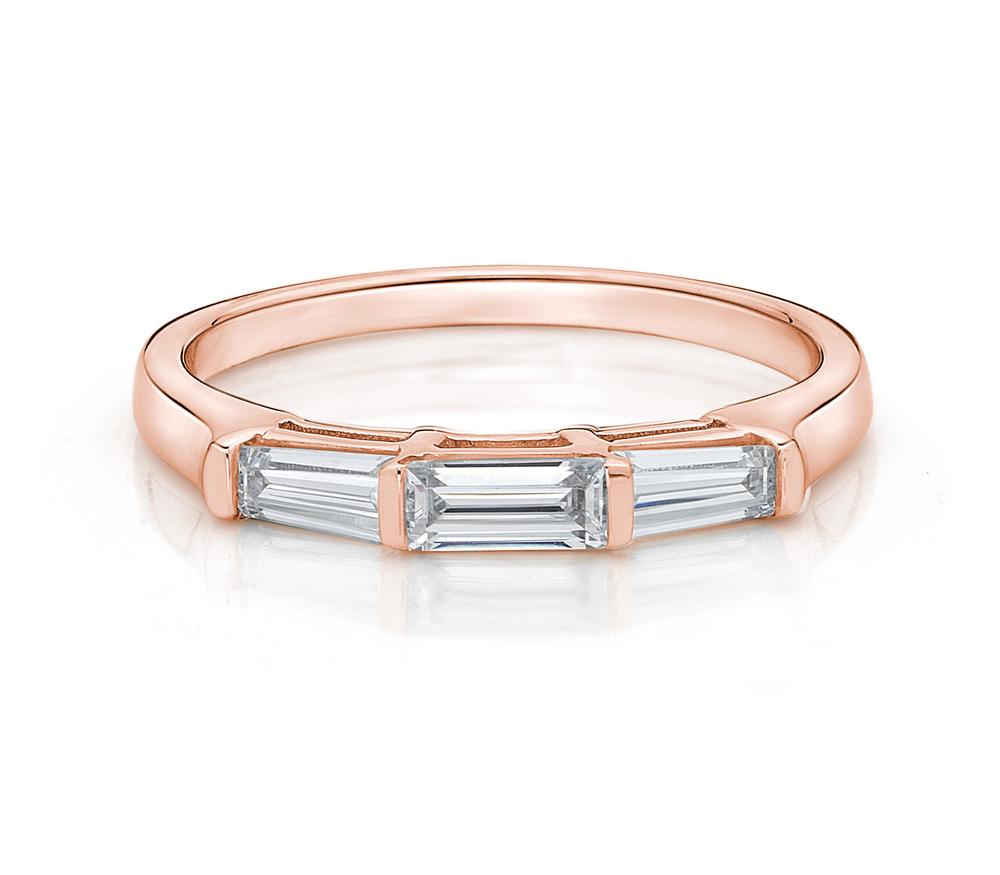 Wedding or eternity band with 0.66 carats* of diamond simulants in 14 carat rose gold