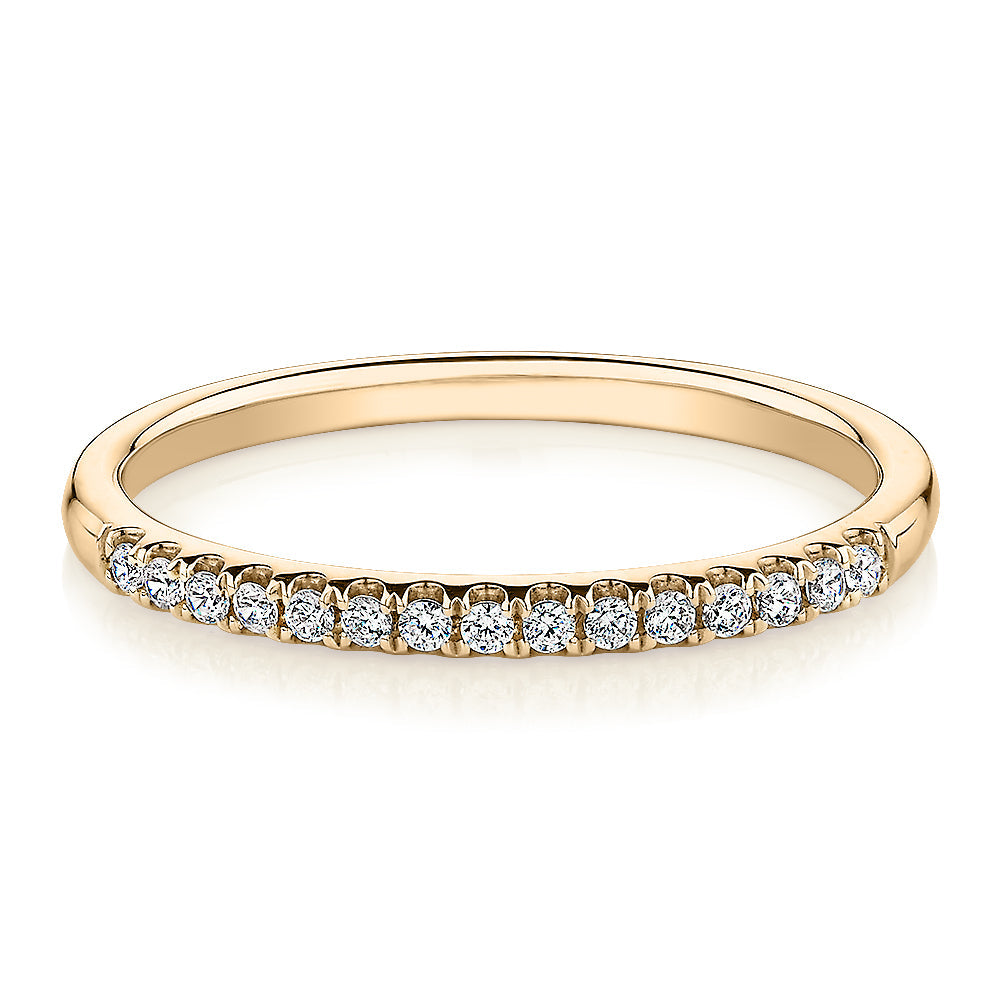 Wedding or eternity band in 14 carat yellow gold
