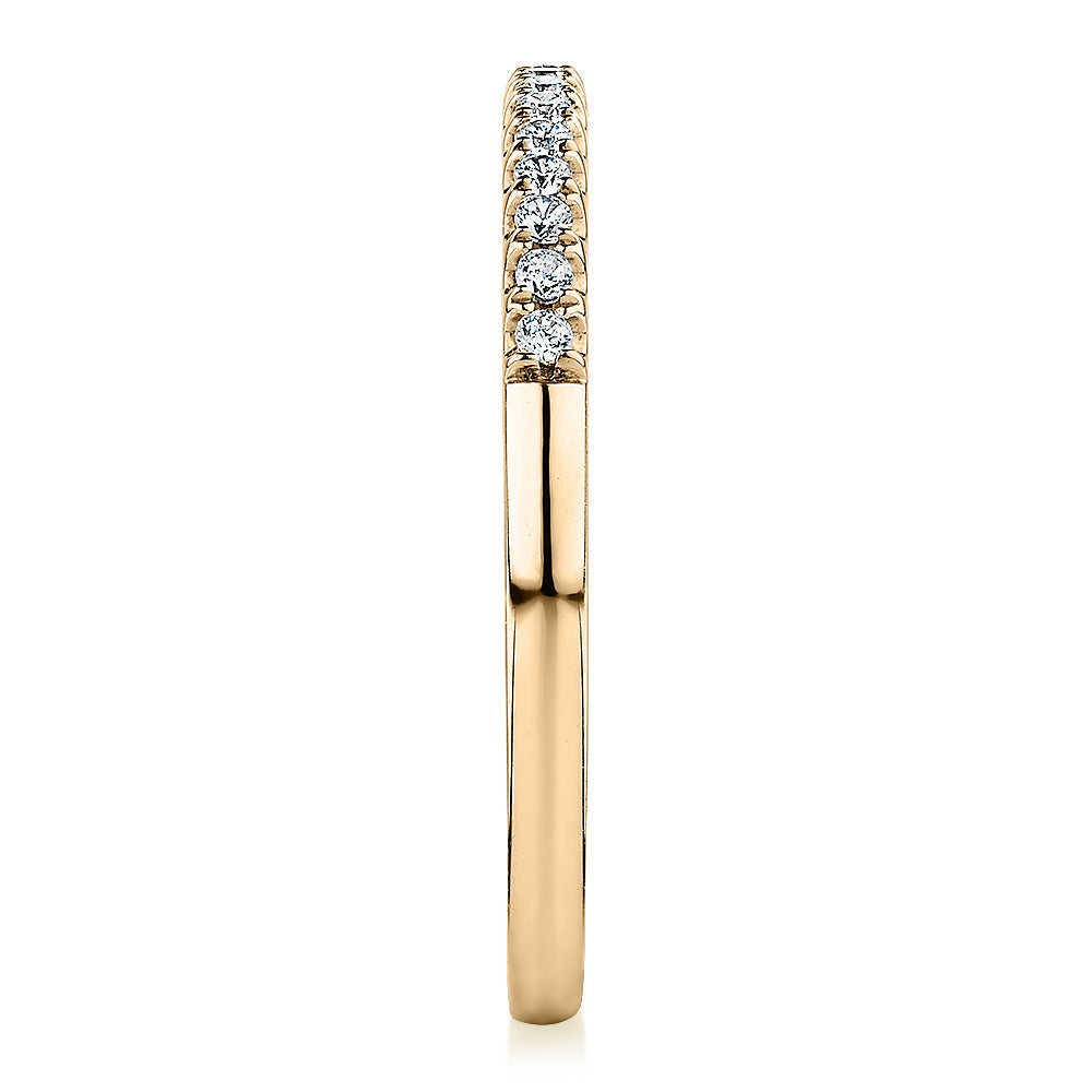 Wedding or eternity band in 14 carat yellow gold