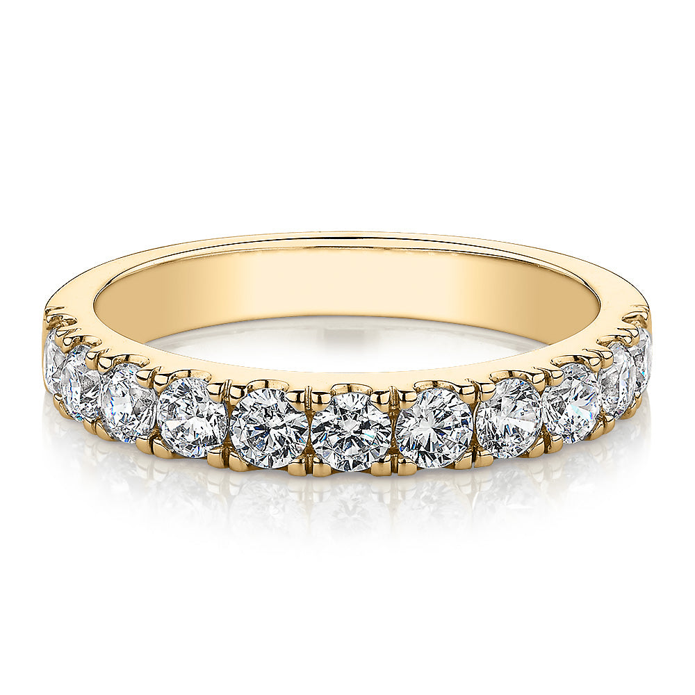 Wedding or eternity band with 0.88 carats* of diamond simulants in 14 carat yellow gold