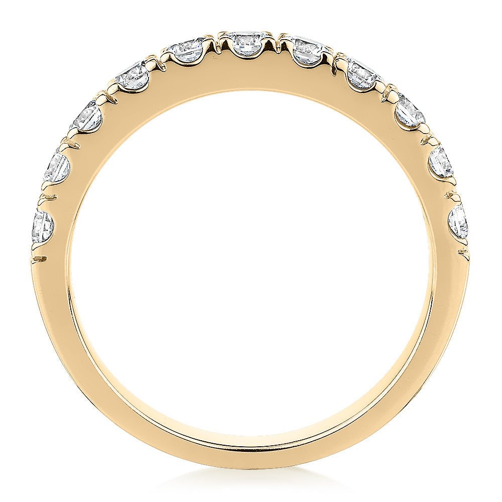 Wedding or eternity band with 0.88 carats* of diamond simulants in 14 carat yellow gold