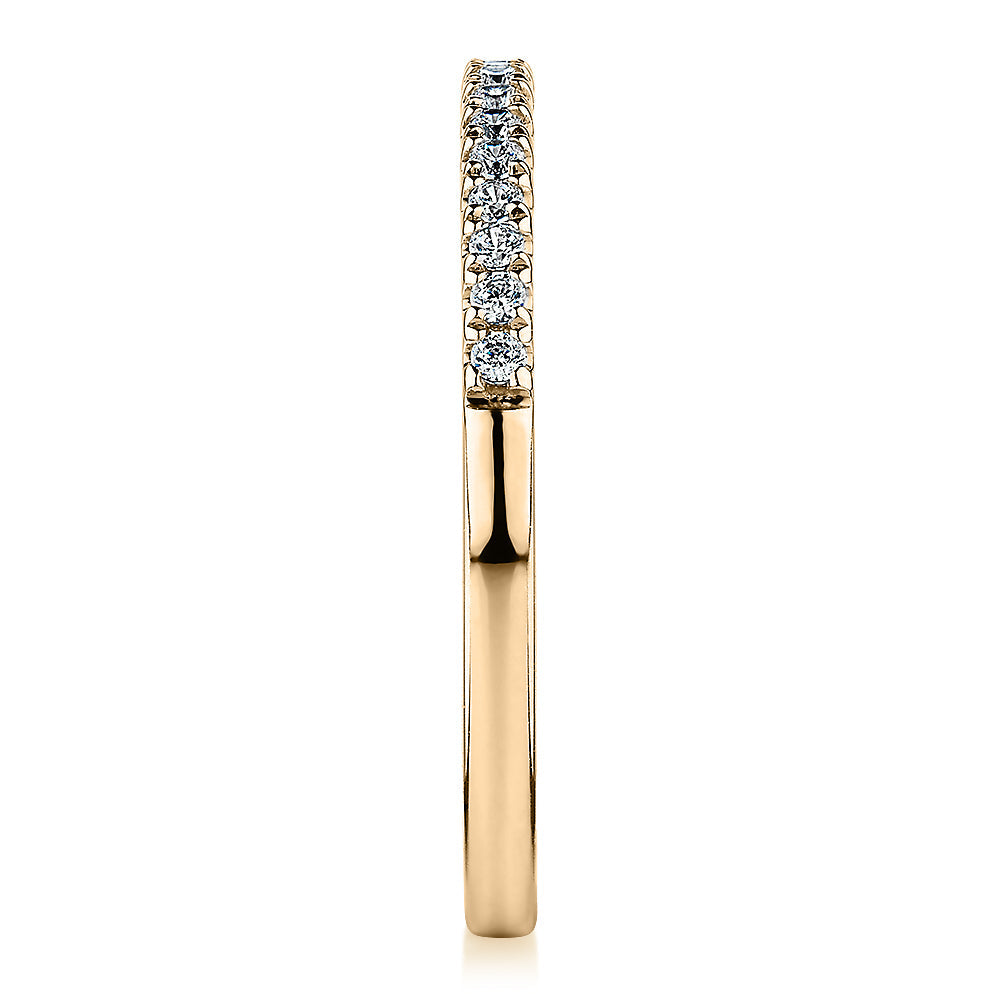 Wedding or eternity band in 14 carat yellow gold