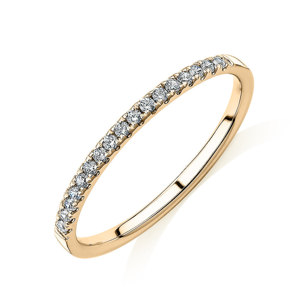 Wedding or eternity band in 14 carat yellow gold