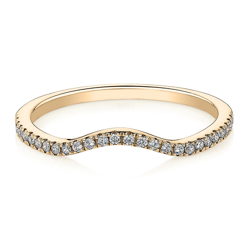 Curved wedding or eternity band in 14 carat yellow gold