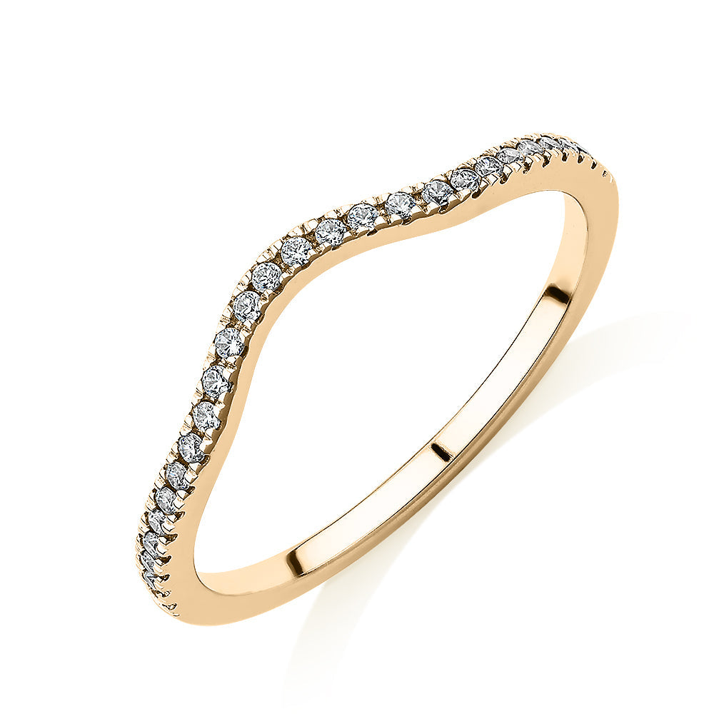 Curved wedding or eternity band in 14 carat yellow gold