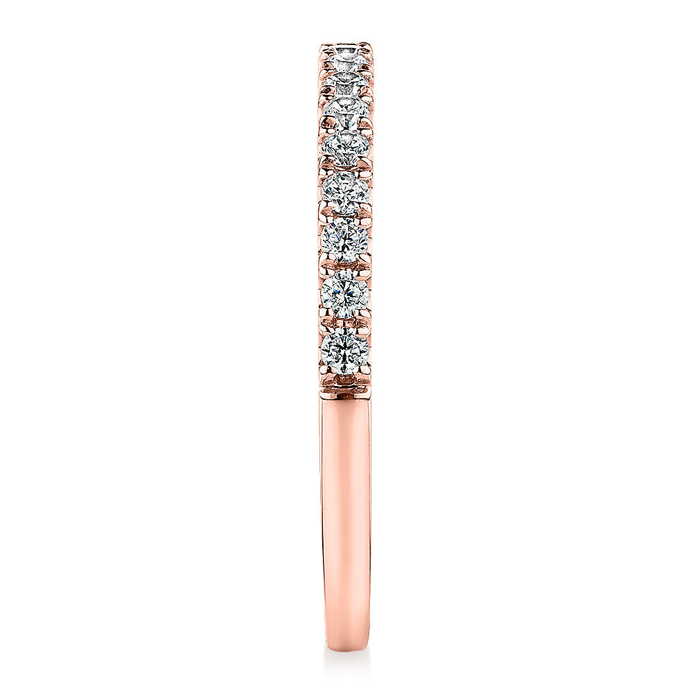 Wedding or eternity band with 0.25 carats* of diamond simulants in 10 carat rose gold