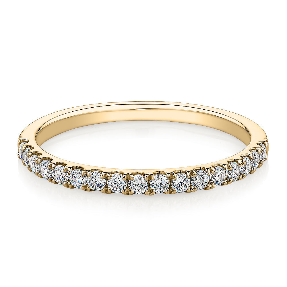 Wedding or eternity band with 0.25 carats* of diamond simulants in 10 carat yellow gold