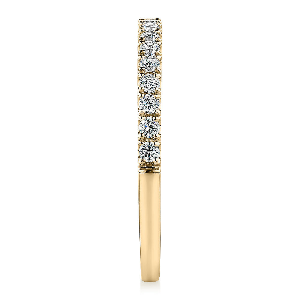 Wedding or eternity band with 0.25 carats* of diamond simulants in 10 carat yellow gold