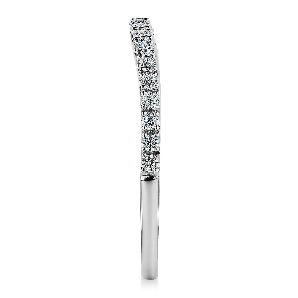 Curved wedding or eternity band with 0.25 carats* of diamond simulants in 10 carat white gold