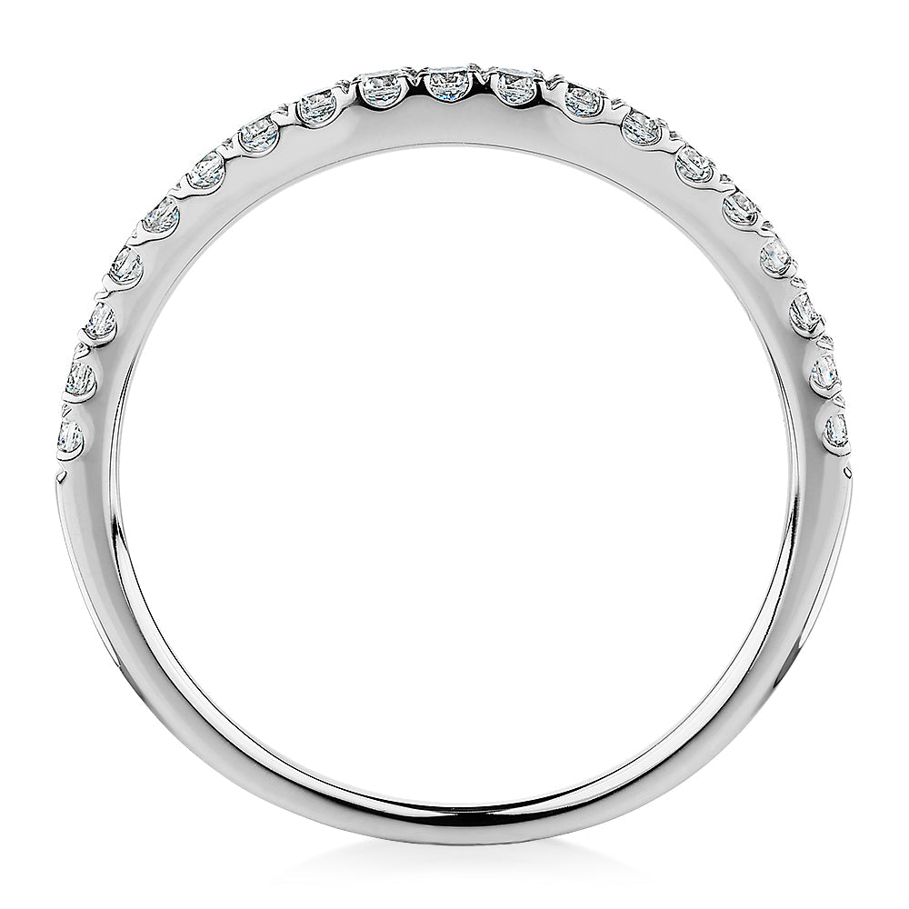 Curved wedding or eternity band with 0.25 carats* of diamond simulants in 10 carat white gold