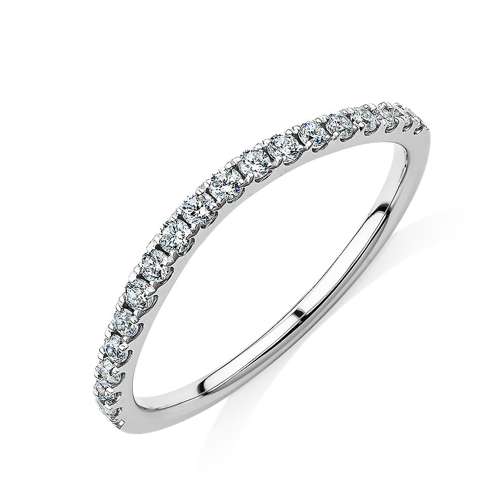 Curved wedding or eternity band with 0.25 carats* of diamond simulants in 10 carat white gold