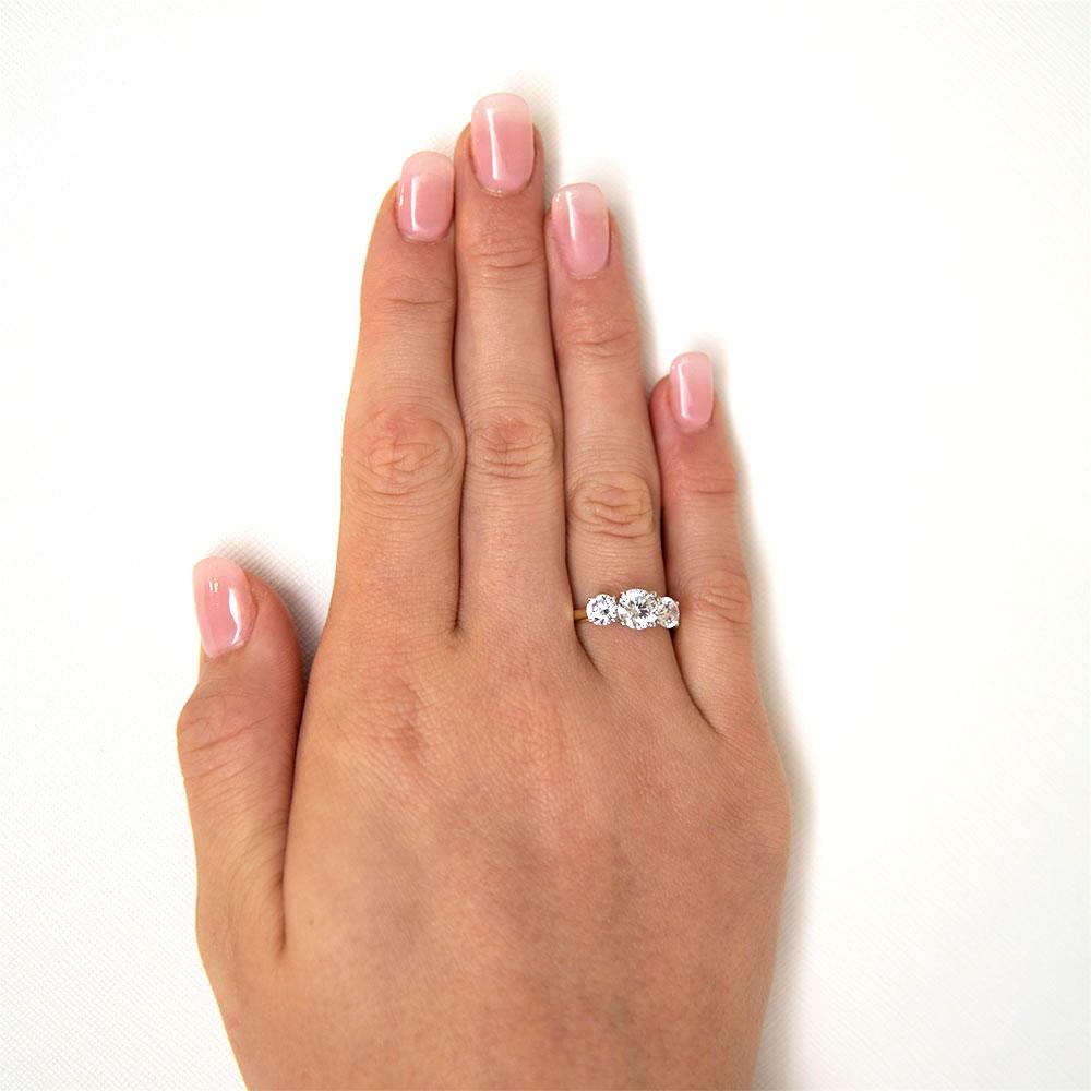 Signature Simulant Diamond 2.00 carat* TW round brilliant cut three stone engagement ring in 10 carat yellow and white gold