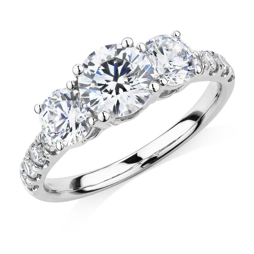 Three stone ring with 2.19 carats* of diamond simulants in 10 carat white gold