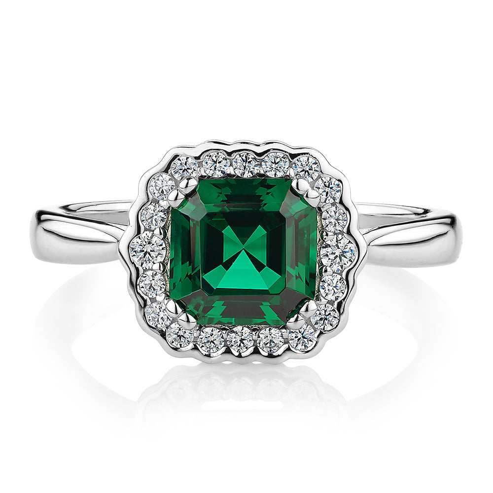 Dress ring with emerald simulant in sterling silver