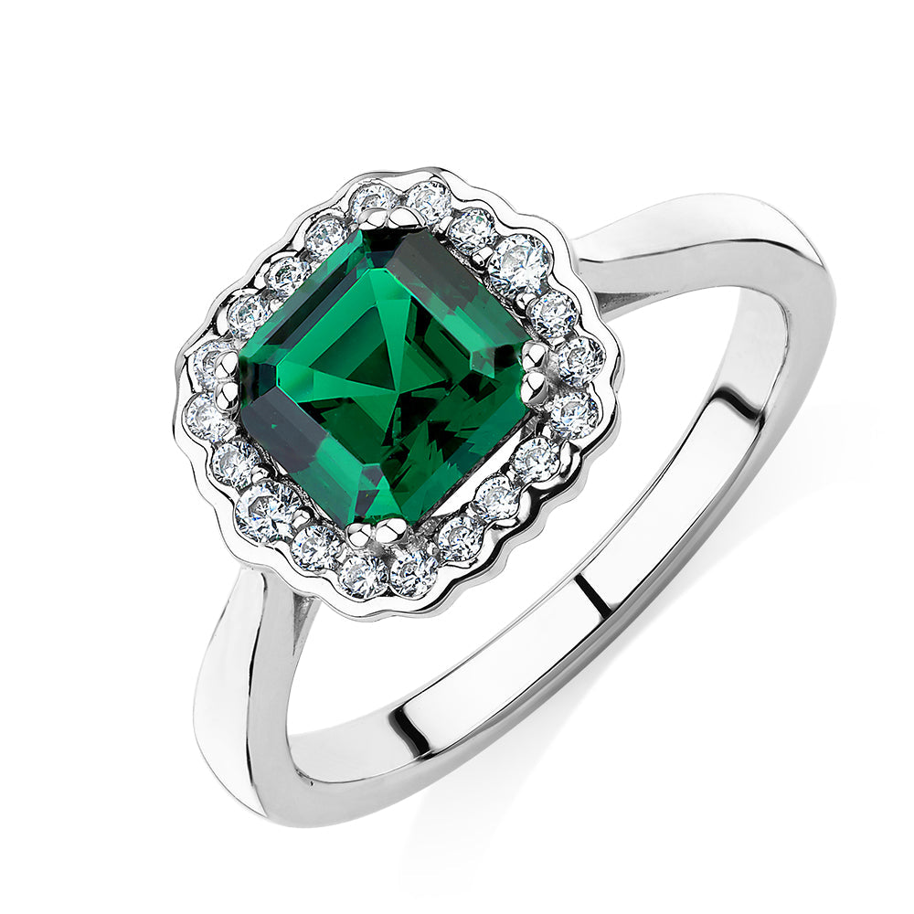 Dress ring with emerald simulant in sterling silver