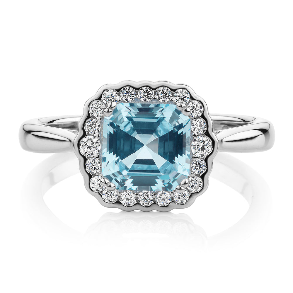 Dress ring with blue topaz simulant in sterling silver