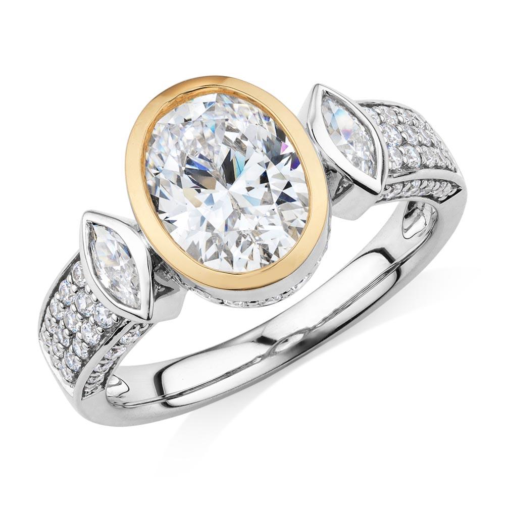 Synergy dress ring with 2.66 carats* of diamond simulants in 10 carat yellow gold and sterling silver