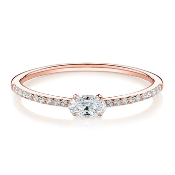 Dress ring with 0.31 carats* of diamond simulants in 10 carat rose gold