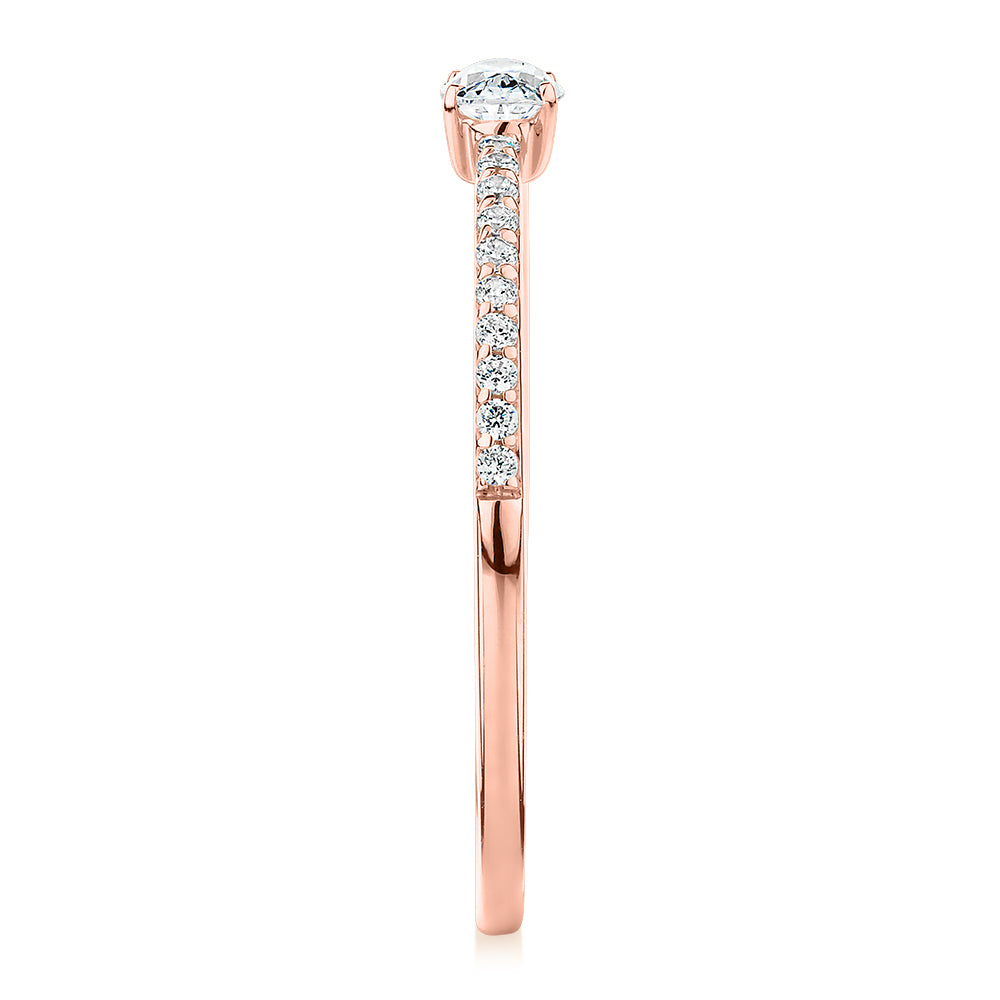 Dress ring with 0.31 carats* of diamond simulants in 10 carat rose gold