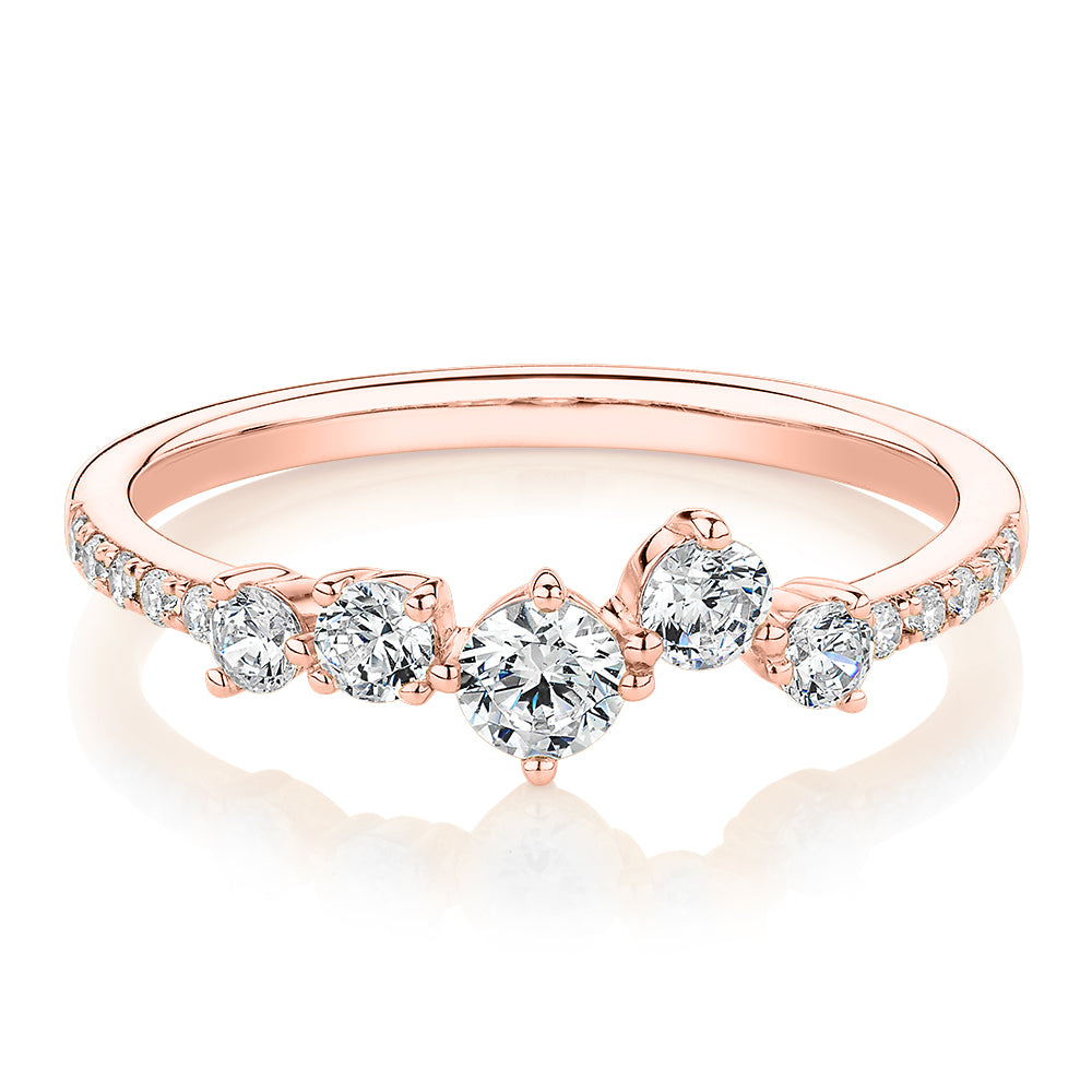 Dress ring with 0.46 carats* of diamond simulants in 10 carat rose gold